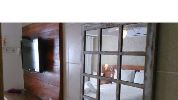 habitacion-p1-standard-quad-room-01-double-bed-single-02-pousada-praia-joao-fernandes-32136.jpg